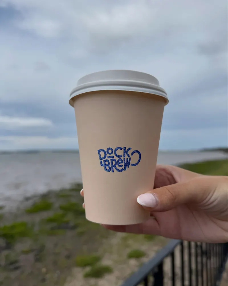 A Dock & Brew cup by the Mersey